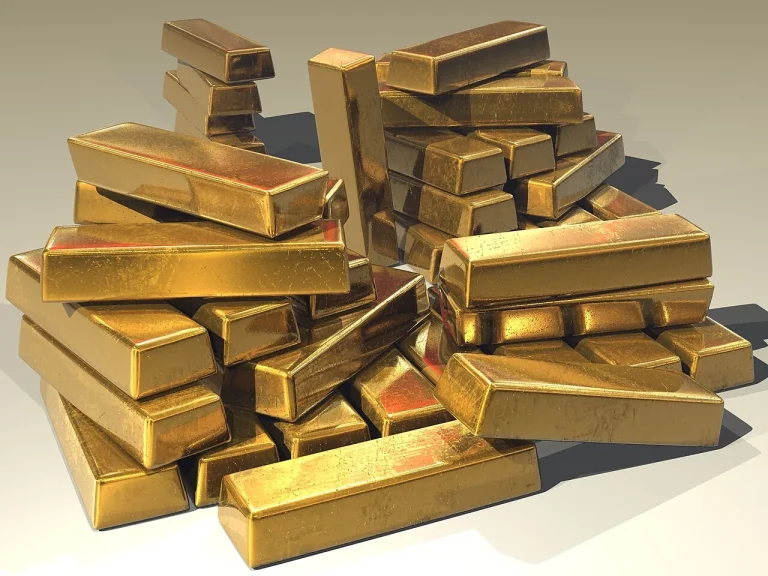 Gold in Uncertain Times: Why Buyers Keep Coming Back — and the Case Against Stacked gold bullion bars