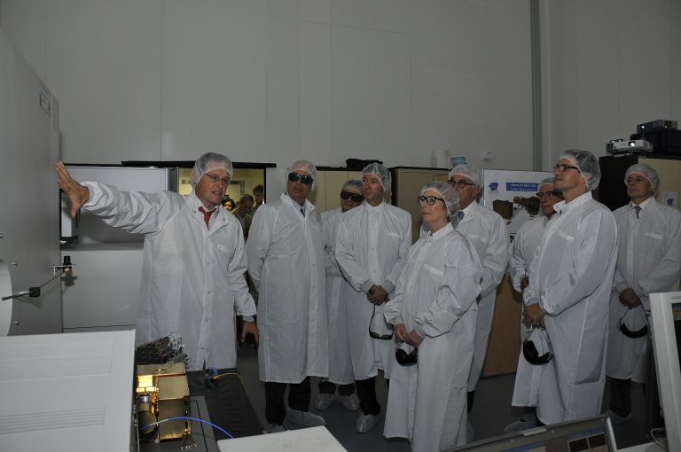 Japan to Back $21 Billion GlobalFoundries Chip Plants in New York Semiconductor wafer being inspected inside a chip factory clean room